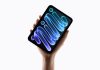 Apple unveils OLED iPad mini with A20 Pro and water resistance The new iPad mini held in the palm of a hand.